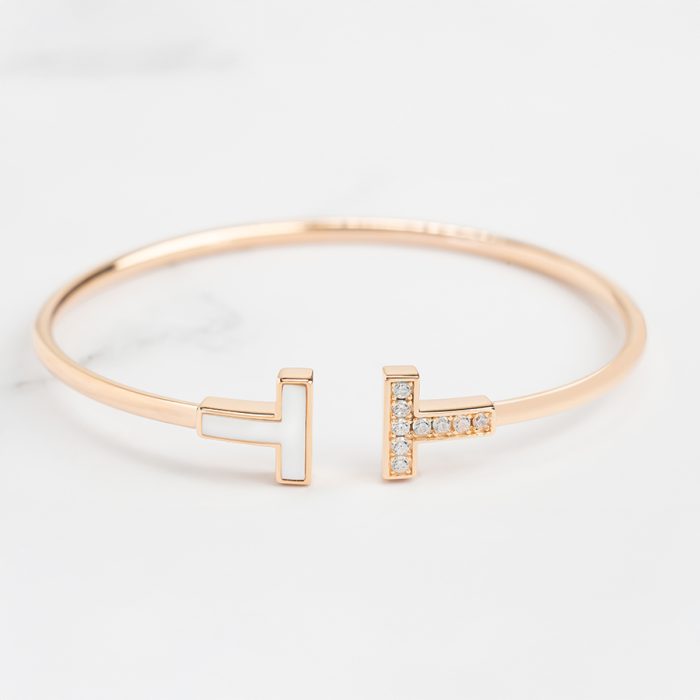 Modern Fritillaria bangle plated in 18K gold Modern Fritillaria Bangle Plated in 18K Gold - Image 1